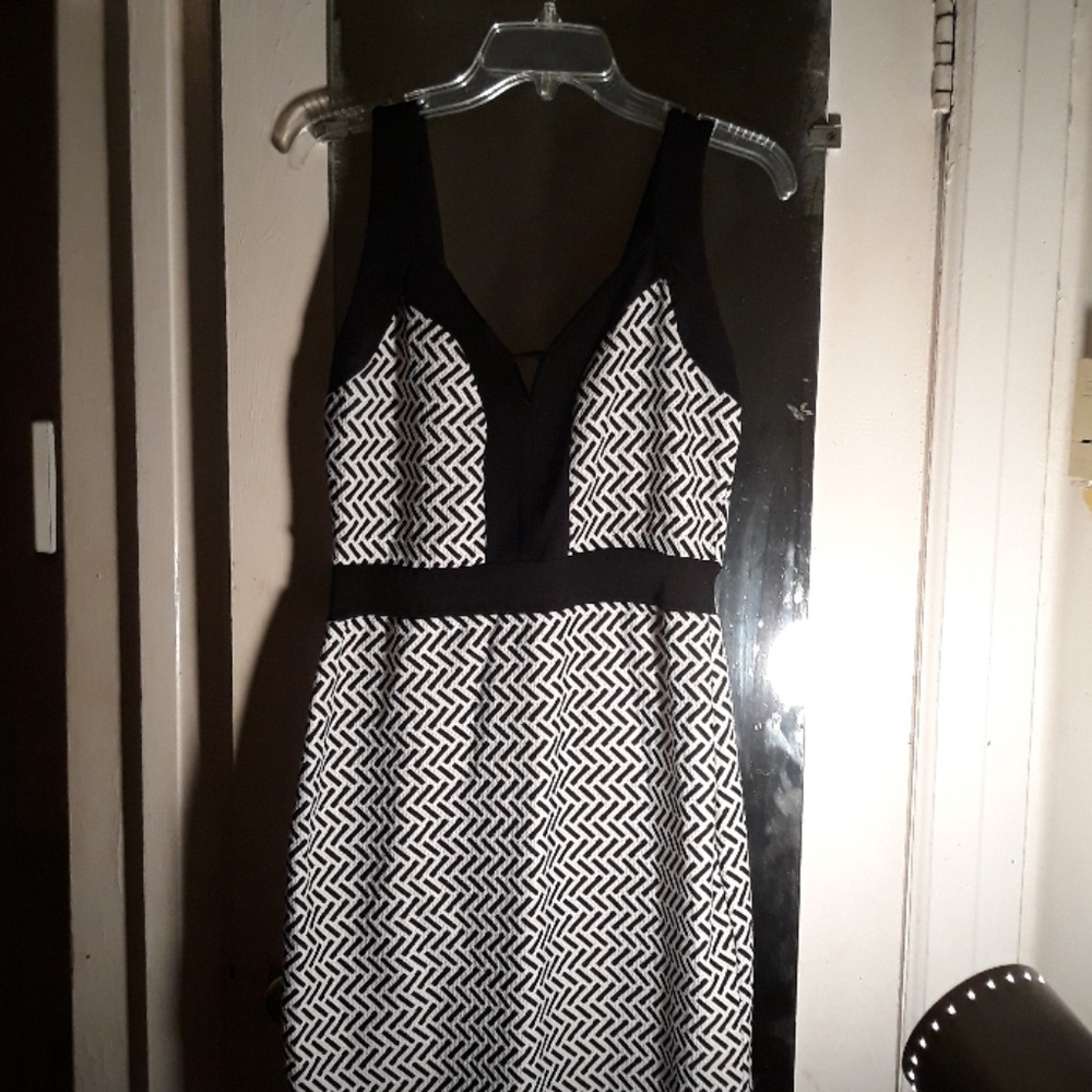 Black and white knee level dress size m